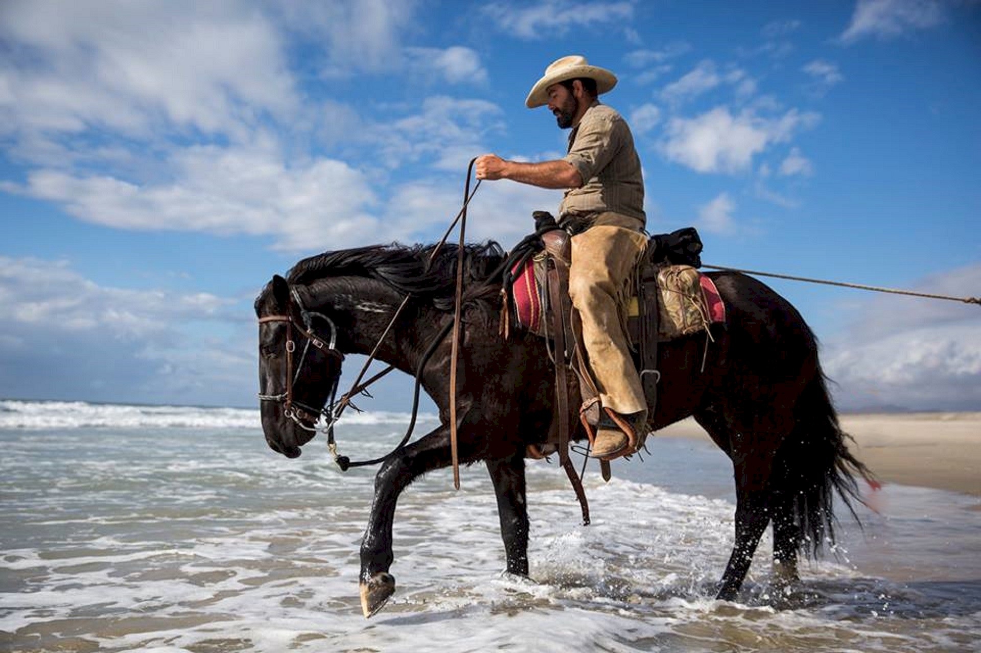 cowboy-horse-riding-water